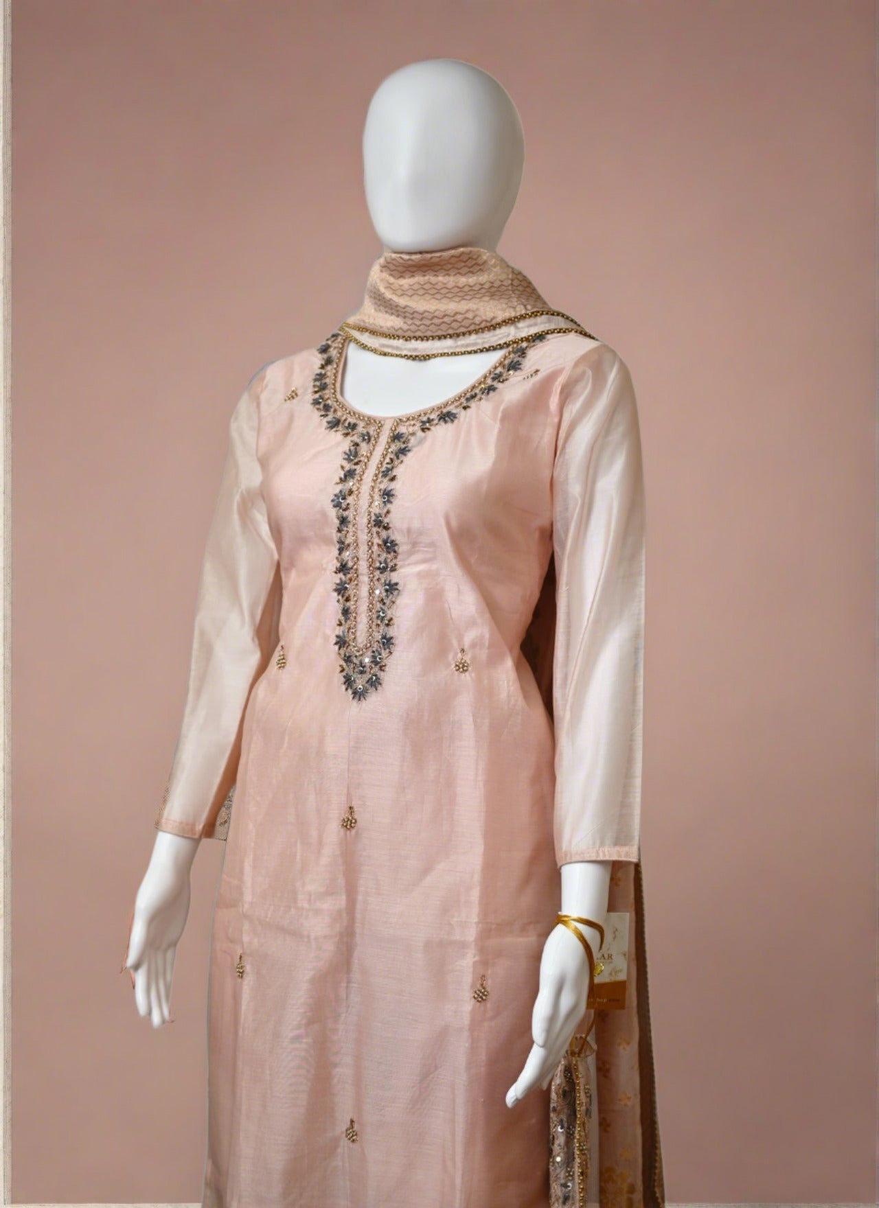 Peach Embroidered Salwar Suit with Pouch